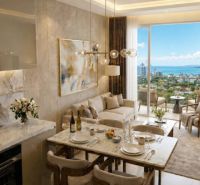 2-bedroom apartment with a sea view, elegant living room, and dining area.