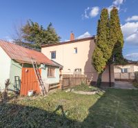 A family house on Mlynska Street in Piešťany, with an adjacent building and a garden.