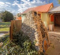 A family house on Mlynska Street in Piešťany with a stone oven and a garden.