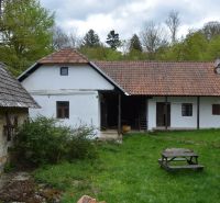 A traditional family house in Bukovec with historical features and a garden in the countryside.