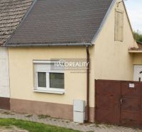 A family house in Malacky with a small front garden and a simple facade.