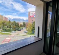 View from a 2-room apartment to the Tatras on Karpatská Street in Poprad.