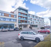 A recreational apartment in Stará Lesná with parking in front of the building and a beautiful scenery.