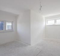 White room and two windows in a 4-room apartment, floor with wood decor.