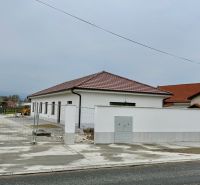 Family house on Hlavná Street in Vlčany, white facade, red roof.