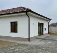 A family house on Hlavná Street in Vlčany with a wooden decor floor and a terrace.