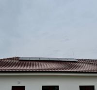 A family house on Hlavná Street in Vlčany with solar panels on the roof.