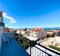 Brač offers a beautiful view of the sea and rooftops from the vacation apartment.