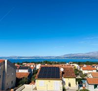 Sea view and rooftops of houses at a holiday apartment on Brač.