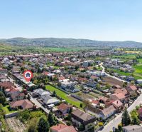 Aerial view of a neighborhood with family houses in Stupava on Hollého Street.