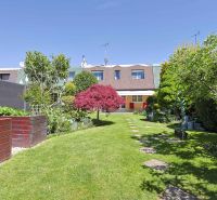 A breathtaking garden of a family house in Stupava on Hollého Street full of greenery and flowers.