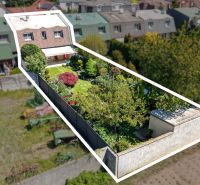 Aerial view of a family house on Hollého Street in Stupava with a landscaped garden.