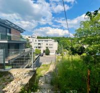 Búdková Street, Bratislava - Staré Mesto; green slope, new family house construction.