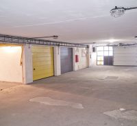 Parking garages in Bratislava on Majerníkova Street with lighting and colorful doors.