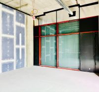Commercial spaces with large glazing and construction modifications.