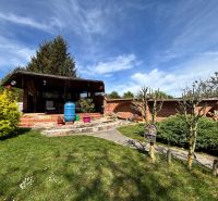 A family house in Veľké Chlievany with a terrace and a well-maintained garden.