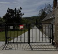Gate with a paved driveway in Borinka, on Borinka Street, Residential plots.