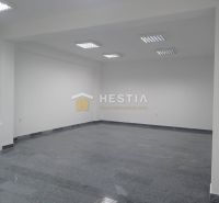 A spacious room with white walls and a stone-look floor in Land - commercial.