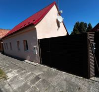 A family house on Mikulášov in Lakšárska Nová Ves with a red roof and a satellite.