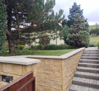 The access path to the family house in Trebostovo, lined with greenery and trees.
