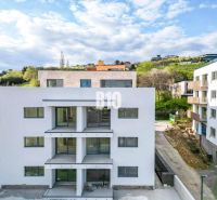 A new building with balconies, surrounded by greenery in Bratislava-Nové Mesto, offers 3-room apartments.