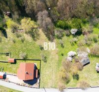 Aerial view of properties - residential area with family houses and greenery on Obrancov Mieru Street in Banská Štiavnica.