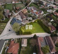 Aerial view of a residential area with plots - housing in Kráľovičove Kračany.