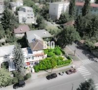 A family house in Bratislava - Staré Mesto surrounded by greenery, with an adjacent garden.