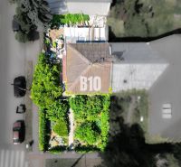 A family house in Bratislava - Old Town surrounded by greenery and a garden from a bird's eye view.