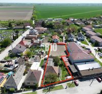 Aerial view of family houses in Kalinkovo, with the plot marked by a red line.