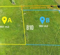 Lands - housing in Nesluša, divided into two parcels: A (981 m²) and B (982 m²).