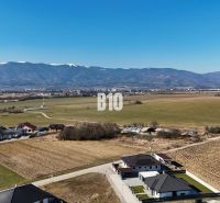 In Diaková, you can see family houses on the outskirts of the village with surroundings and mountains.