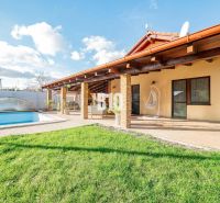 A family house in Nitra with a garden and a covered swimming pool.