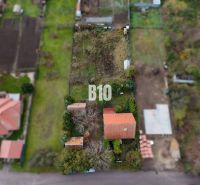 A family house in Vlkas with a large plot and a red roof in a quiet location.