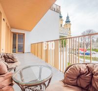 The balcony of the 3-room apartment in Nitra offers a view of the city center.