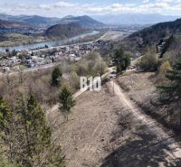 Plots - living in Žilina with a panorama of the river and surrounding hills.