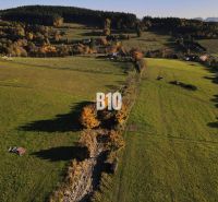 Greenery and meadows in Pozemky - living in Petrovce, surrounded by trees and hills.