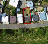 Family house on Nábrežie J. M. Hurbana in Michalovce with adjacent land.