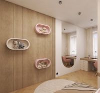 A children's room in a two-room apartment with wooden decor and shelves on the wall.