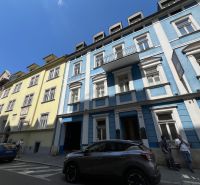 The building on Grösslingova Street in Bratislava - Old Town with a blue facade and offices.