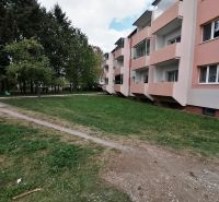 An apartment building on Záborského Street in Martin surrounded by greenery and sidewalks.