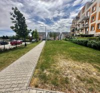 The sidewalk next to the building on Bystrická Street in Bratislava - Devínska Nová Ves.