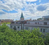 A view of historical architecture and greenery from Poštová Street in Bratislava - Old Town.