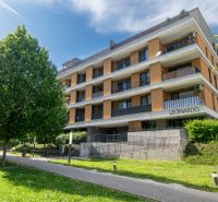 Apartment building on Bajkalská Street in Bratislava with terraces and green areas.