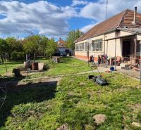 Family house in Dedinka with a garden, lawn area, and a tool shed.