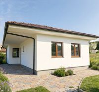 A family house on Pánska Niva in Hlohovec with a stone pathway and a well-maintained garden.