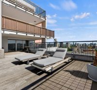 Terrace with sun loungers, Jégého Street, Bratislava - Ružinov, city view.