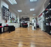 Commercial premises with furnishings and flooring with a wooden decor.