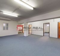 Interior space with offices and blue carpet in warehouses and halls.