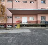Building on Púchovská Street in Bratislava III with warehouses and halls.